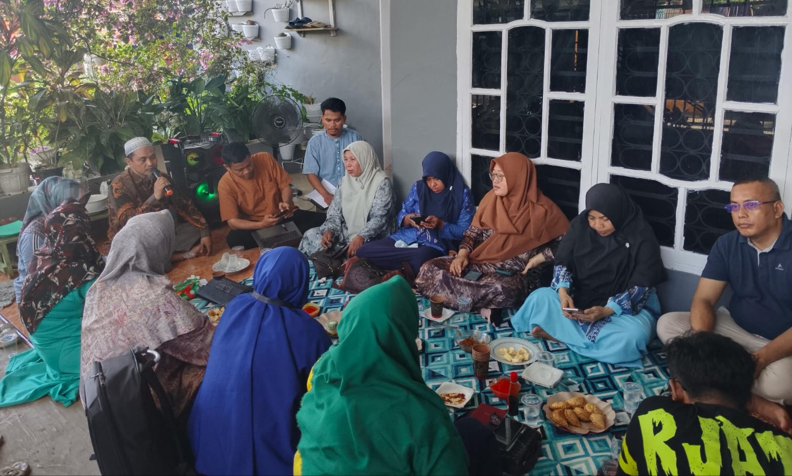 Pertemuan di rumah salah satu pembina