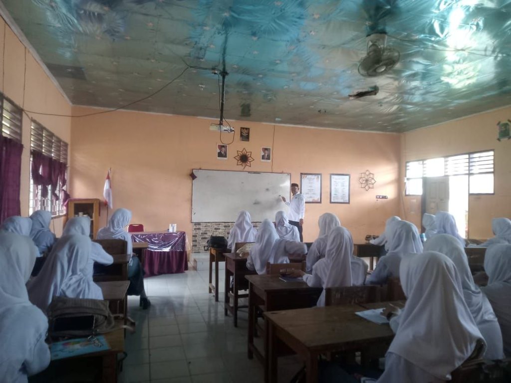 Melaksanakan bimbingan di SMAN 26 Bone